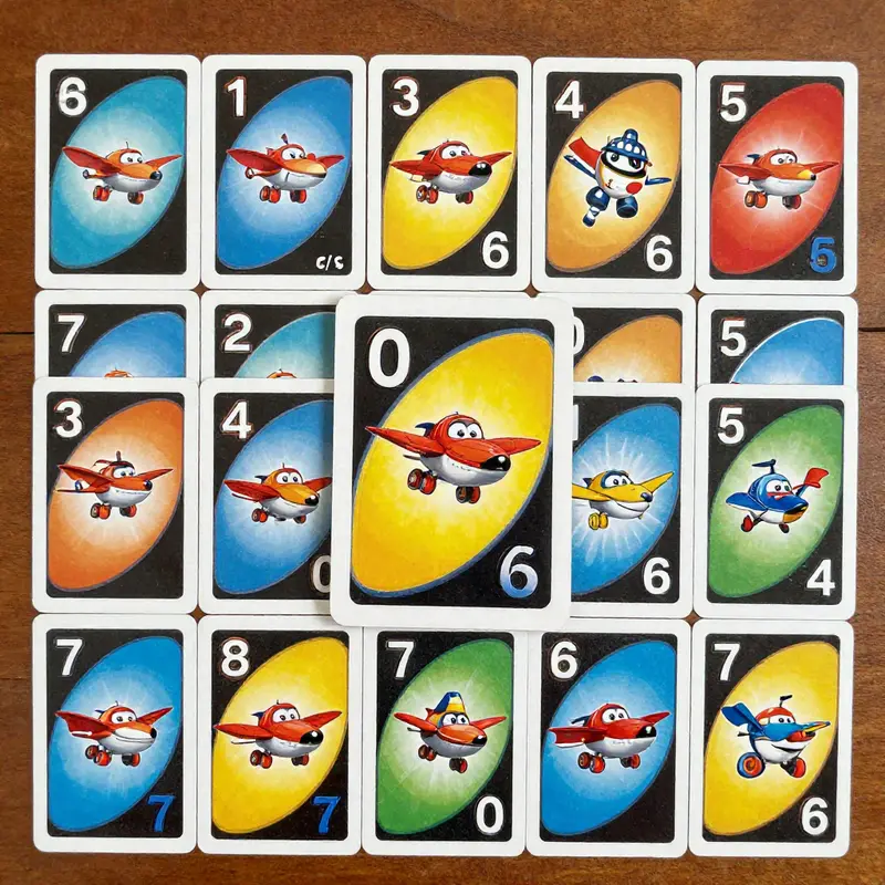 Initial game setup for UNO Disney Planes: Fire & Rescue, showcasing organized cards and players ready to begin.